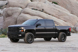 Fabtech 14-18 GM C/K1500 w/OE Alum. UCA 4in Perf. System w/DL 2.5 Coilovers & Rear DL 2.25 Shocks