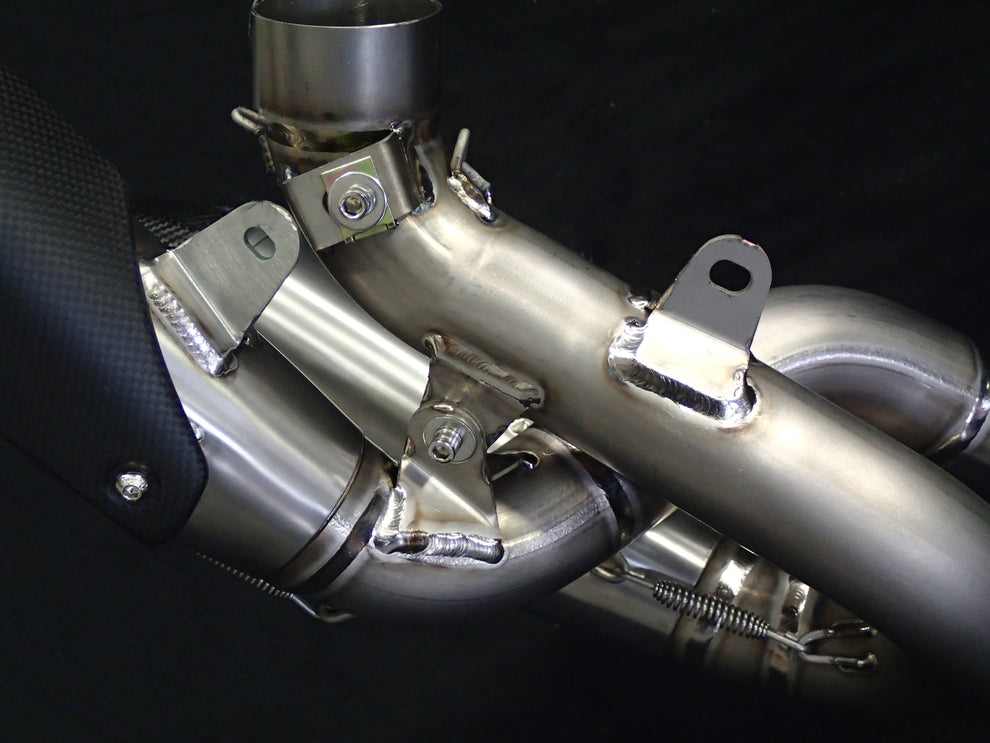 Close-up of a motorcycle exhaust system Vandemon All Titanium Slip-On For 2018-24 Ducati Panigale & Streetfighter V4S/V4R