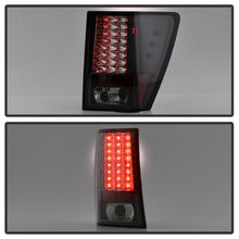 Laden Sie das Bild in den Galerie-Viewer, Spyder Jeep Grand Cherokee 07-10 LED Tail Lights Black ALT-YD-JGC07-LED-BK
