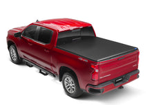 Laden Sie das Bild in den Galerie-Viewer, Lund 05-17 Nissan Frontier Styleside (5ft. Bed) Hard Fold Tonneau Cover - Black
