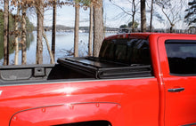 Laden Sie das Bild in den Galerie-Viewer, Lund 04-15 Nissan Titan (5.5ft. Bed) Hard Fold Tonneau Cover w/Bracket Kit - Black