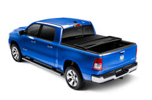 Laden Sie das Bild in den Galerie-Viewer, Lund 02-17 Dodge Ram 1500 (5.5ft. Bed) Genesis Elite Tri-Fold Tonneau Cover - Black