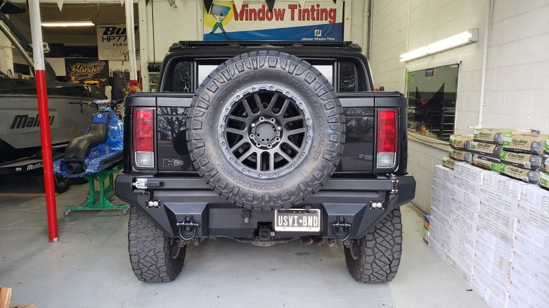Road Armor 03-09 Hummer H2 Dakar Rear Non-Winch Bumper w/Tire Carrier - Tex Blk