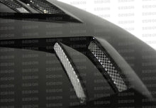 गैलरी व्यूवर में इमेज लोड करें, Seibon 08-09 Mitsubishi Lancer (CYA4/5A) DV Style Carbon Fiber Hood