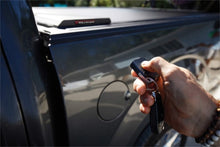 Laden Sie das Bild in den Galerie-Viewer, Roll-N-Lock 2019 Ram 1500-3500 SB 74.5in E-Series Retractable Tonneau Cover