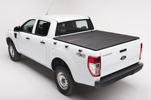 Carica l'immagine nel visualizzatore di Gallery, Extang 09-13 Nissan Frontier (6ft Bed) (w/ or w/o Track Sys) (6ft) Solid Fold 2.0